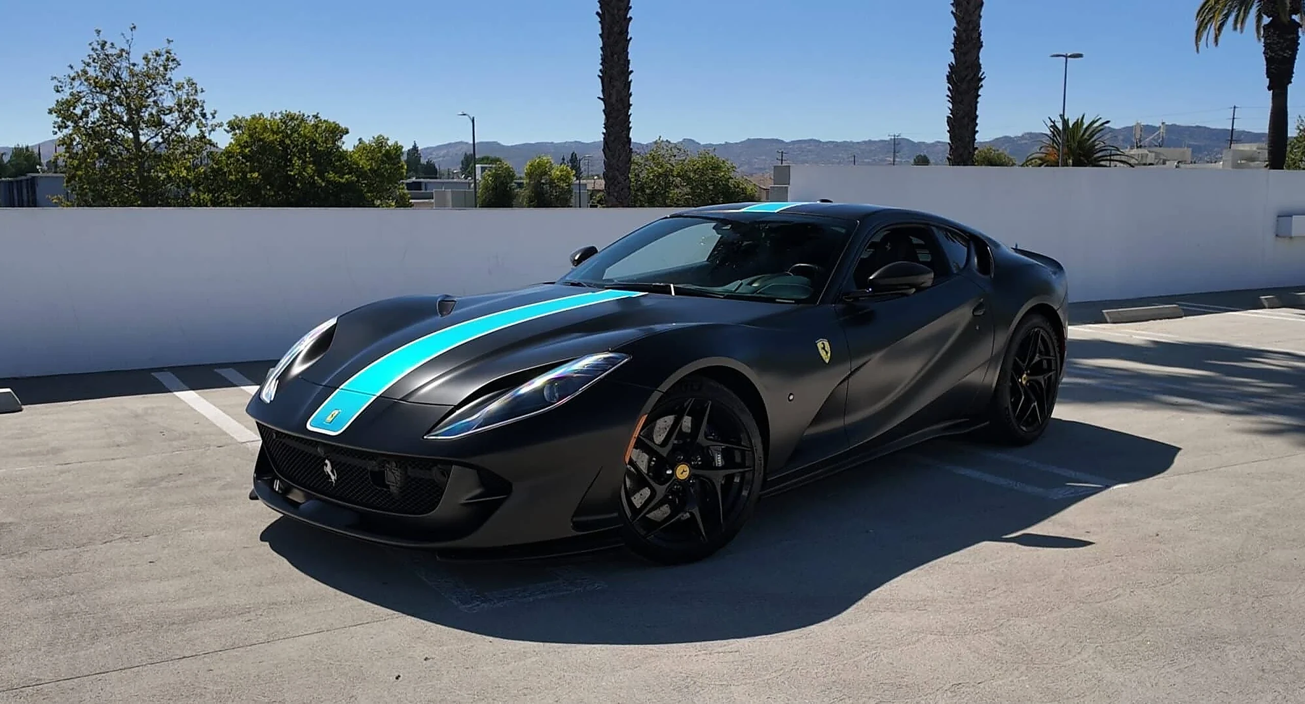 Ferrari 812 Superfast detail relevant to v12 exotic car rentals on LUXURY CAR CLUB